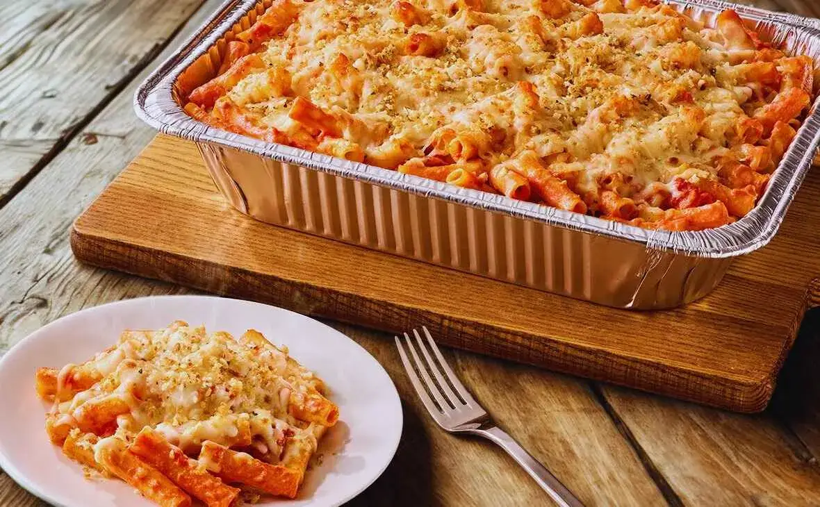 Olive Garden family-size Five Cheese Ziti al Forno tray with baked pasta, marinara sauce, and melted cheese blend