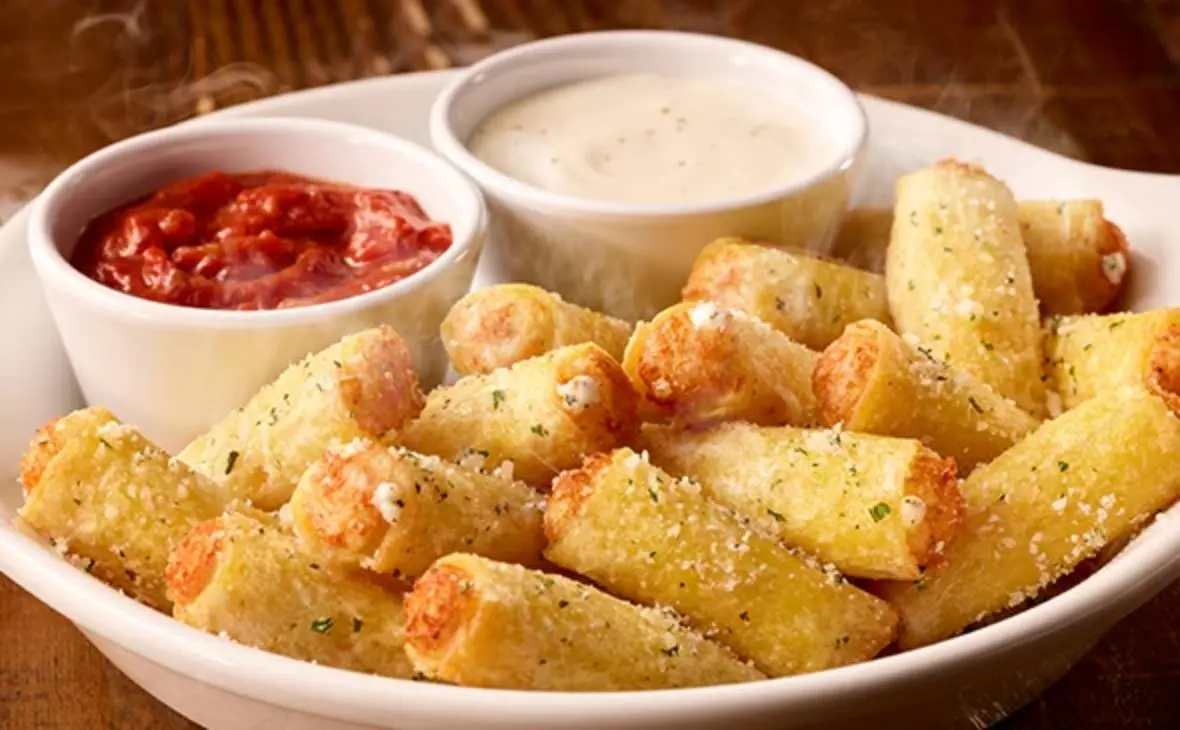 Olive Garden Stuffed Ziti Fritta served crispy with marinara and Alfredo dipping sauces