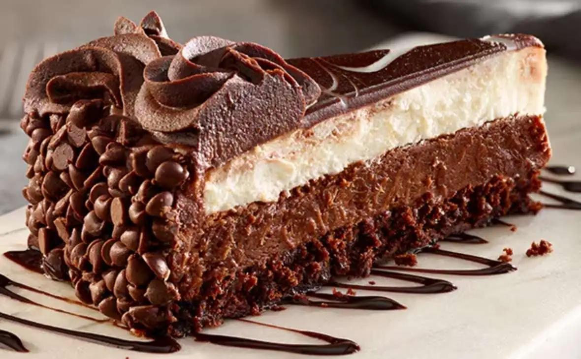 Olive Garden Black Tie Mousse Cake with layers of chocolate cake, creamy mousse, and chocolate ganache