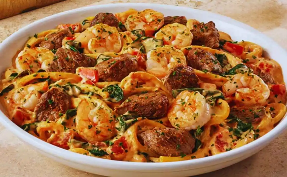 Olive Garden Calabrian Steak and Shrimp Bucatini with spicy Calabrian chili cream sauce