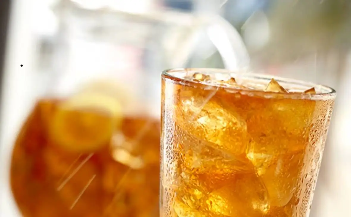 Fresh brewed unsweet iced tea served over ice in a glass