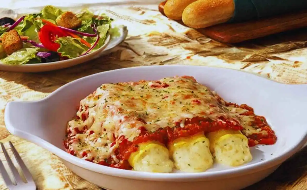 Olive Garden Four-Cheese Manicotti baked with marinara sauce and melted mozzarella