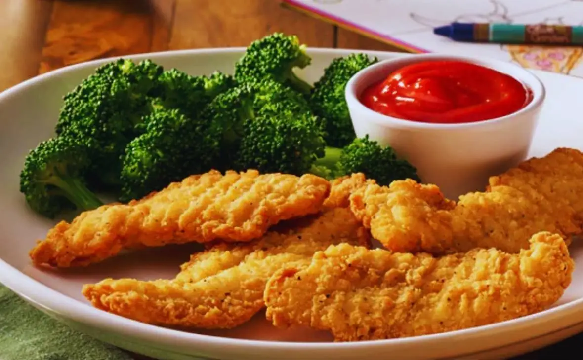 Olive Garden kids chicken fingers served with broccoli and dipping sauce