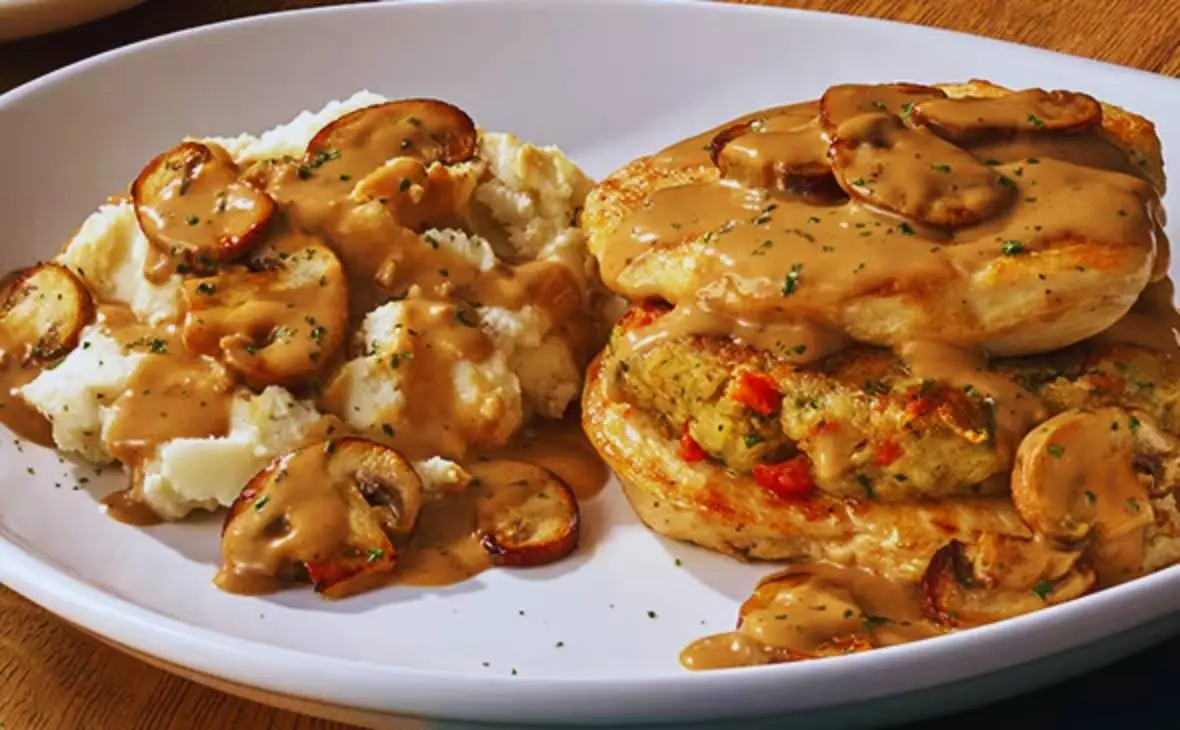 Olive Garden Stuffed Chicken Marsala topped with creamy mushroom Marsala sauce and served with mashed potatoes